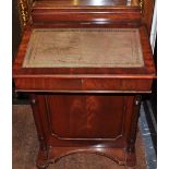 A reproduction Victorian design mahogany davenport fitted four drawers
