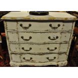 A pair of French Provincial style white painted parcel gilt four drawer chest with brass handles on