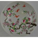 A Chinese famille rose pattern bowl decorated with bats and peach trees,