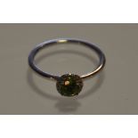 A peridot and diamond cluster dress ring