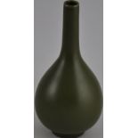 A Chinese tea dust glaze long neck vase,