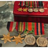 A World War Two medal group including Pacific and 1939/45 stars, unnamed,