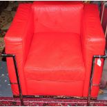 A Corbusier style red leather and chrome square frame armchair