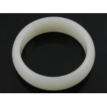 A jade bangle. D.7.5cm