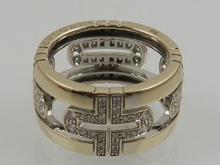 Bulgari. An 18 carat white gold and diamond said 'Parentesi' eternity ring, boxed.