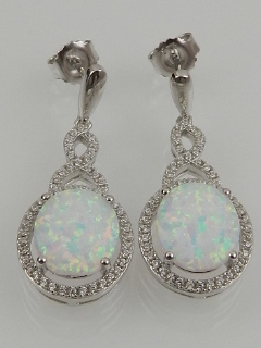 A pair of silver, opalite, and cubic zirconia set cluster drop earrings. - Image 2 of 2