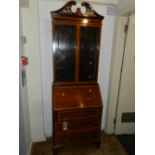 An Edwardian mahogany and boxwood inlaid bureau bookcase,  the astral glazed top above a marquetry
