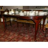 A 20th century mahogany D-end dining table, raised on cabriole legs, together with two leaves.