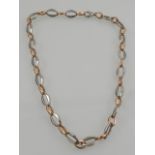 An unusual silver and rose gold open link necklace.