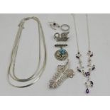 A quantity of silver jewellery, to include two necklaces, a marcasite brooch, three further