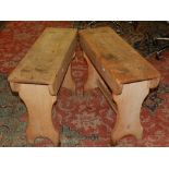 A pair of 20th century oak stools.