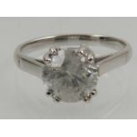 An 18 carat white gold and solitaire diamond ring, the stone of approx. 2.0 carats.