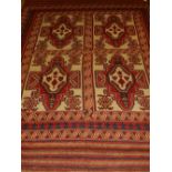 A cream ground Safhari carpet, decorated with geometric patterns to centre, within many borders,