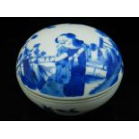 A 19th century Chinese blue and white porcelain ink pot and cover, decorated with noblemen in