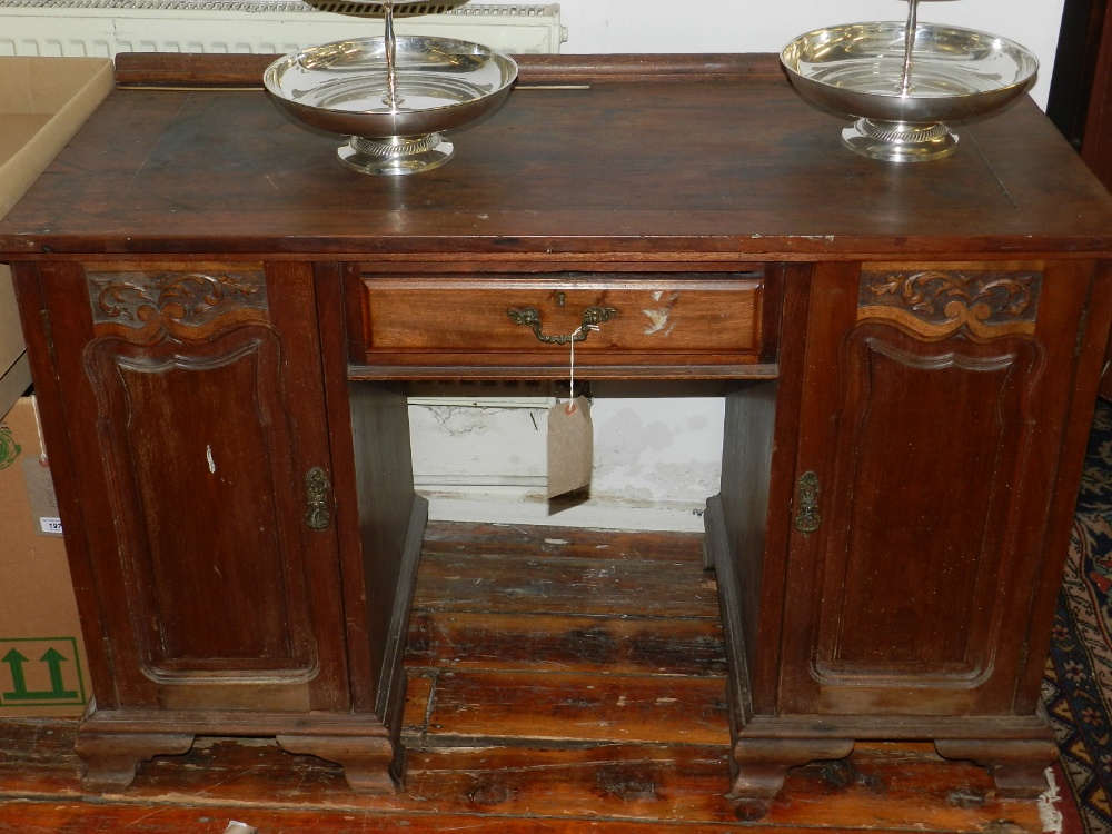 An early 20th century walnut pedestal desk, having single drawer flanked by two cupboard doors. H. - Image 2 of 2