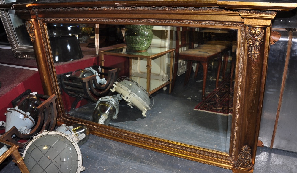A large Victorian style gilt frame over mantle mirror,