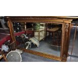 A large Victorian style gilt frame over mantle mirror,
