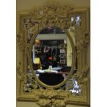 A Victorian style wall mirror with moulded scroll and floral frame, H.