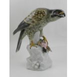 Sitzendorf, Germany, a hard paste porcelain model of a eagle with its prey,