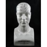 A crackle glaze ceramic model of a phrenology head. H.
