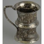 A solid silver Indian tankard 19th Century with snake charmer design 10oz