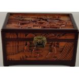 An Oriental hardwood casket with brass lock
