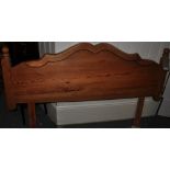 A pine bed headboard,