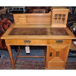 An early 20th Century oak Biedermeier-style single pedestal desk, W.