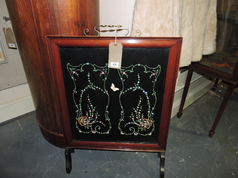 An Edwardian mahogany firescreen,