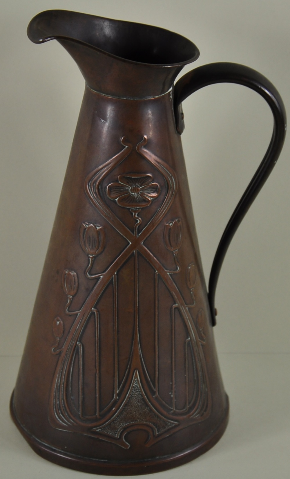 An art Nouveau copper jug