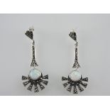 A pair of silver and opal Art Deco style earrings