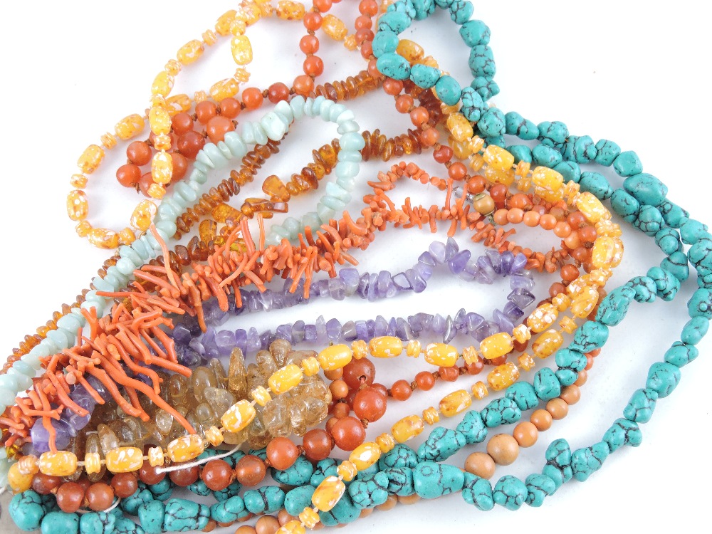 Eight beaded necklaces to include turquoise, coral and amber,