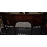 A Georgian Mahogany bow fronted sideboard with glass top table and central drawer,