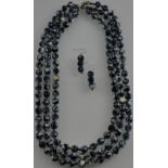 A silver & iolite agate three band necklace with matching earrings