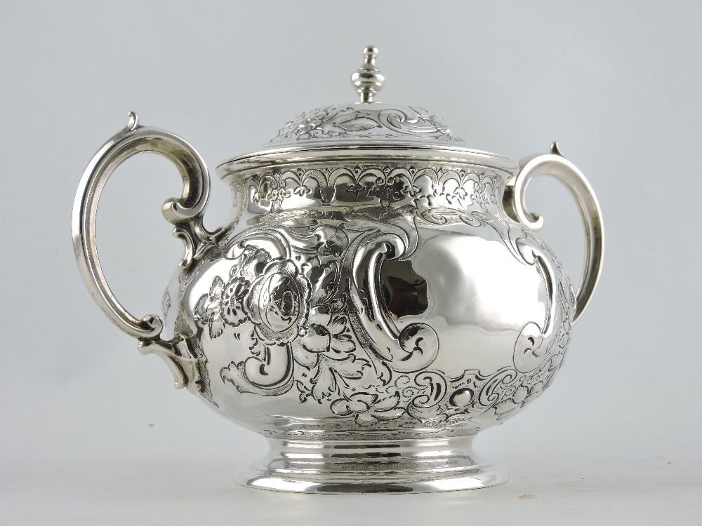 A large Victorian two handled silver porringer and cover,