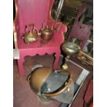 A collection of brass and copper items to include coal scuttle, ash tray etc.