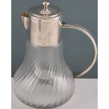 A large plate mounted cut glass lemonade jug with original ice compartment