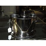 A silver plated twin handled double bottle wine cooler.