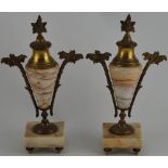 A pair of marble and bronze ormolu garniture