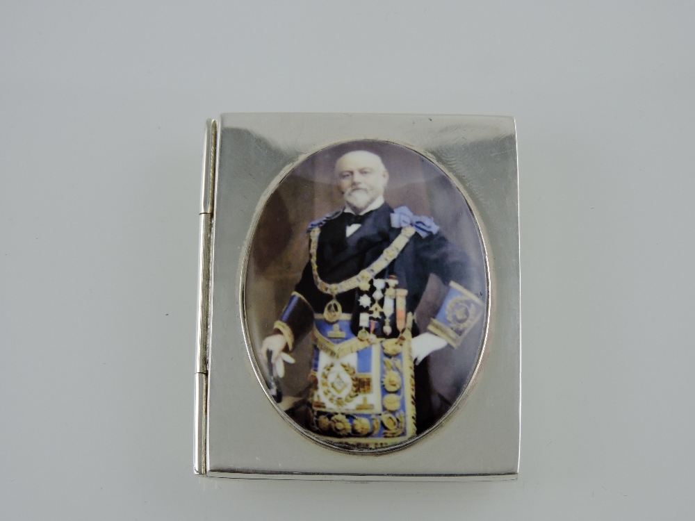 A silver and enamel picture frame