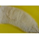 A cream fur collar, possibly Siberian fox,