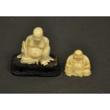 Two late 19th century/ early 20th century ivory Buddhas.