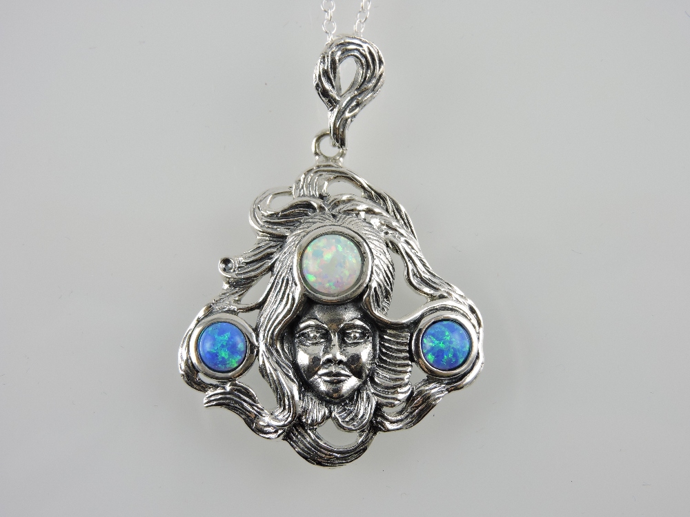 A silver and enamel Art Nouveau style pendant necklace on a silver chain