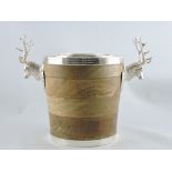 A silver plated ice bucket with stag handles