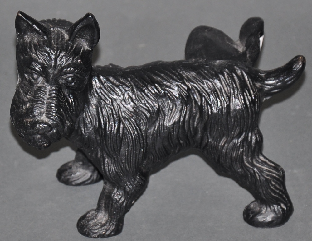 A cast iron door stop modelled in the form of a dog, H. 16cm.