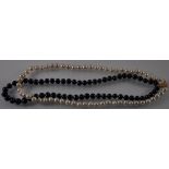 A Chanel style 2 row black and white natural South Sea pearl necklace with 14ct clasp