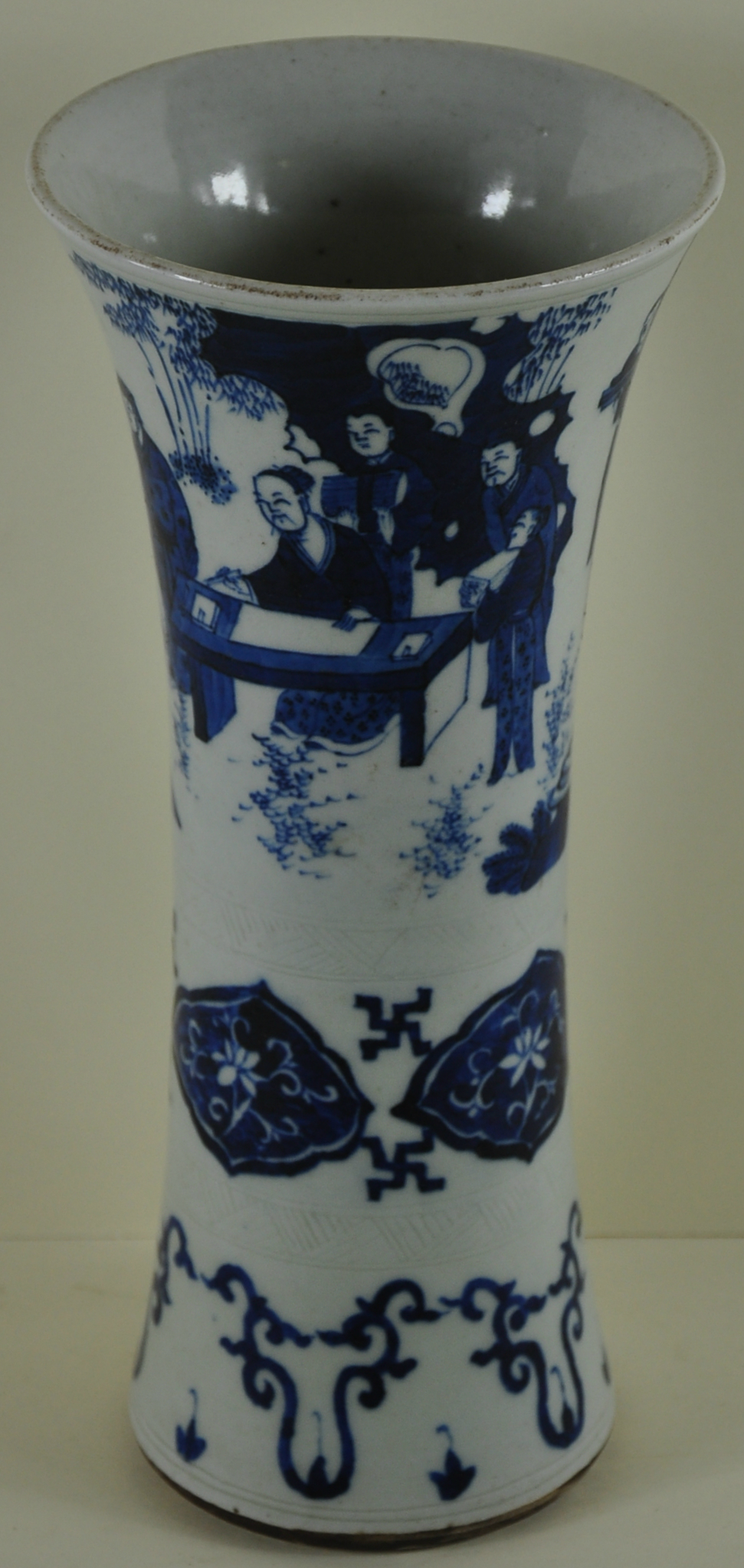 A Chinese blue and white sleeve vase, decorated with a figural scene,