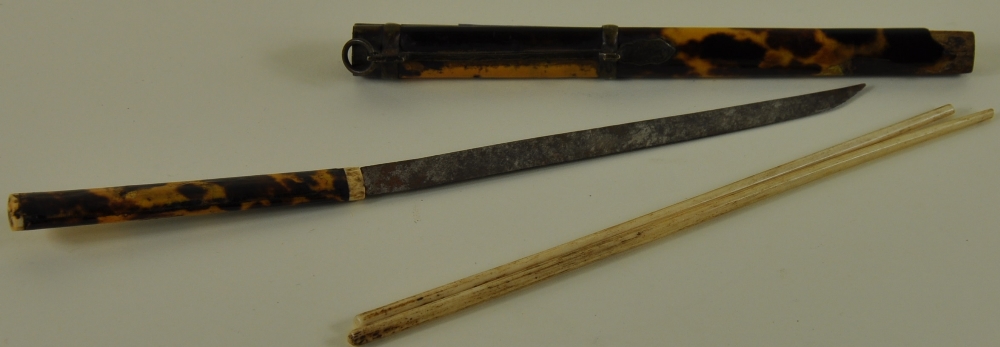 A 19th Century Japanese tortoiseshell cased knife and bone chopstick set with engraved brass mount