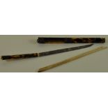 A 19th Century Japanese tortoiseshell cased knife and bone chopstick set with engraved brass mount