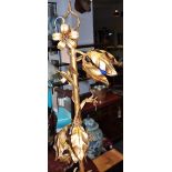 A gilt painted retro metal floor lamp of foliate form, by repute Baldelli,